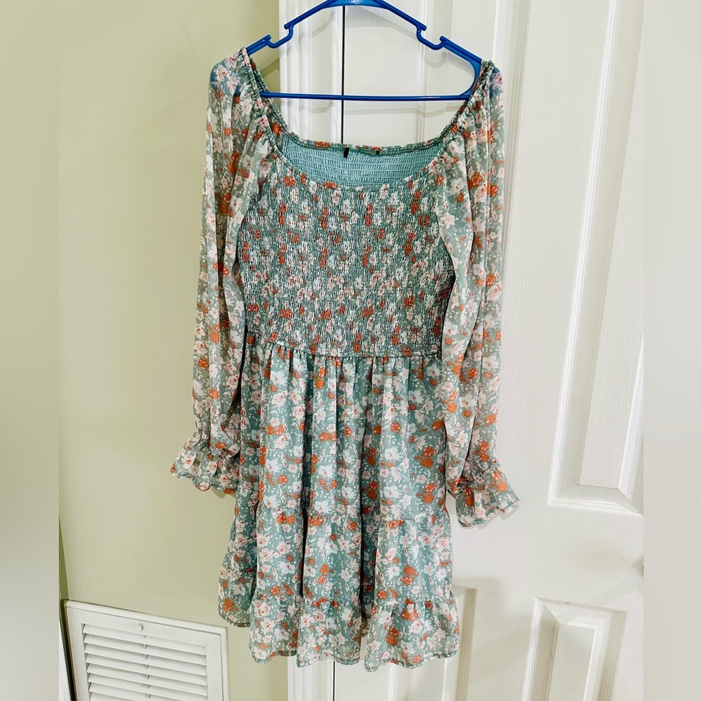 Smocked dress with feminine details